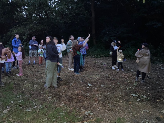 Friends of Adel Woods looking out for bats on a bat walk led by David Preston