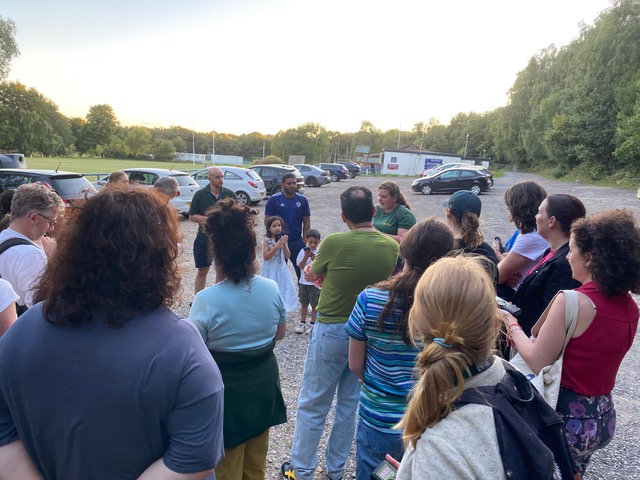 Rachel Todner explains to Friends of Adel Woods how to use bat detectors in Adel Woods.