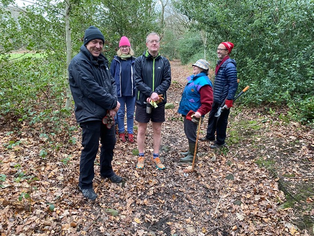 Friends of Adel Woods clearing a path in Adel Woods on the 14th December 2025